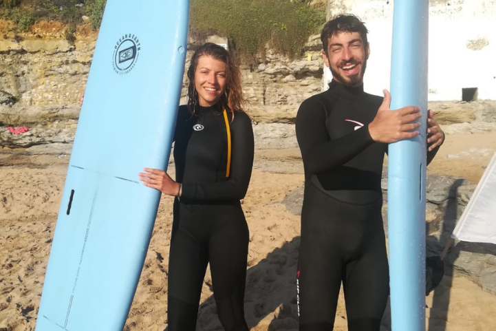 Couple Beginners surfers